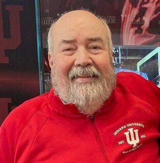 PictureScott Hutchinson after a victorious IU Women's Basketball game, Sprin 2023.